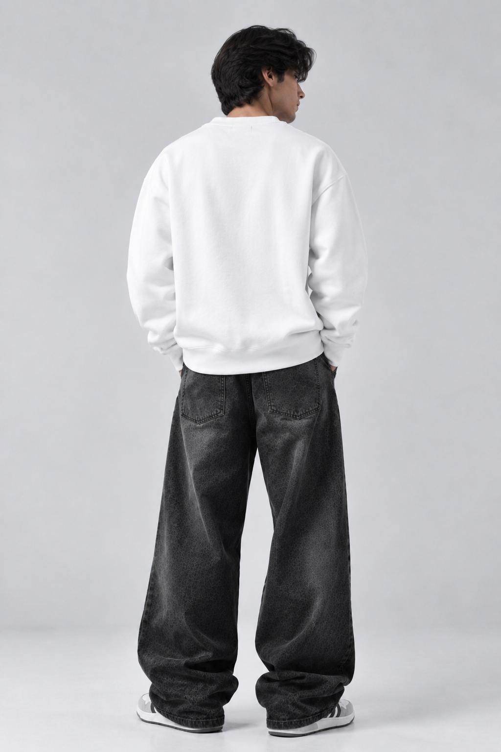 Dropped shoulder seam and ribbed hem on the Dripzy white oversized plain sweatshirt