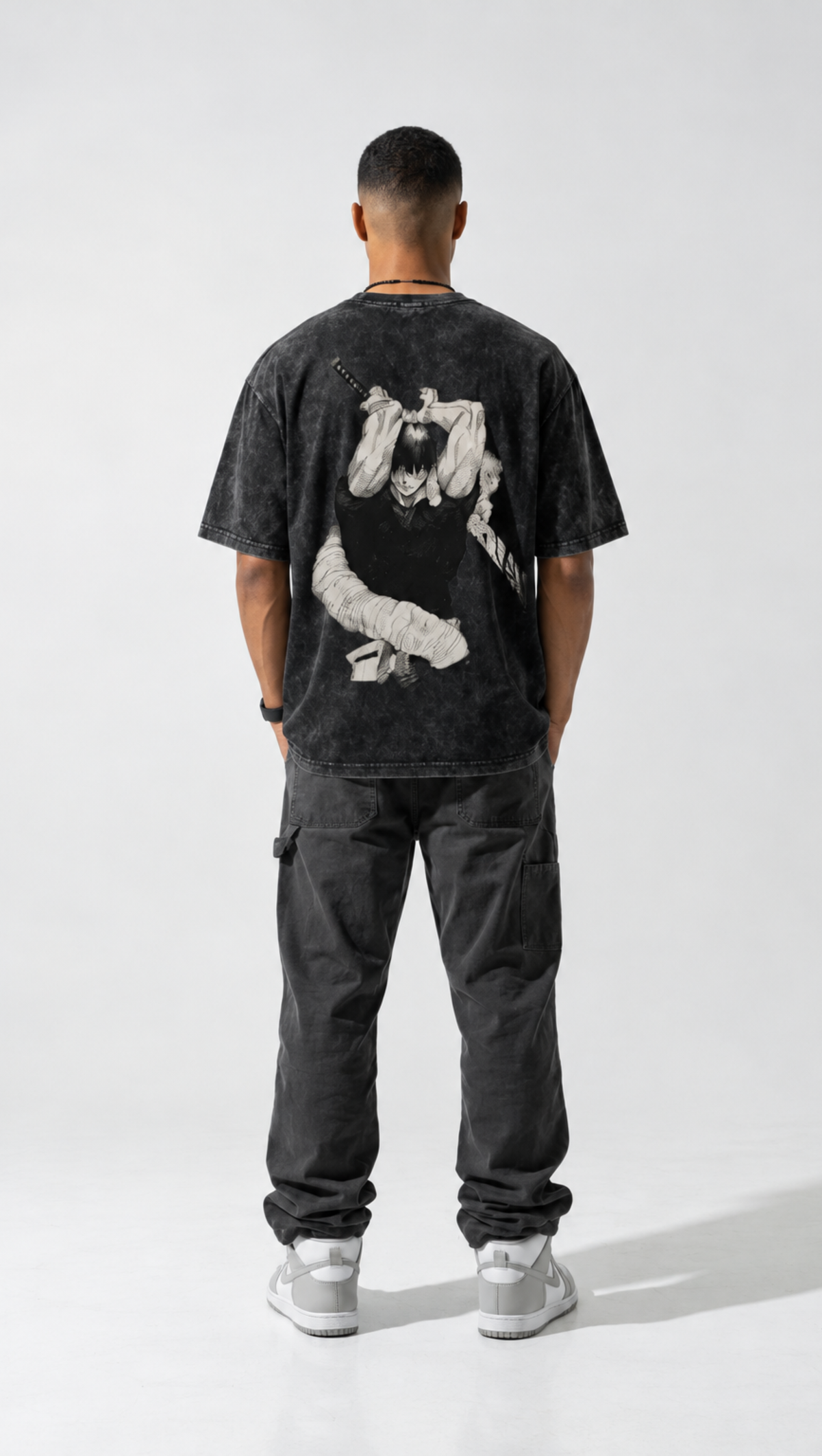 Bandaged back print detail on the Dripzy black garment-dyed Toji washed tee