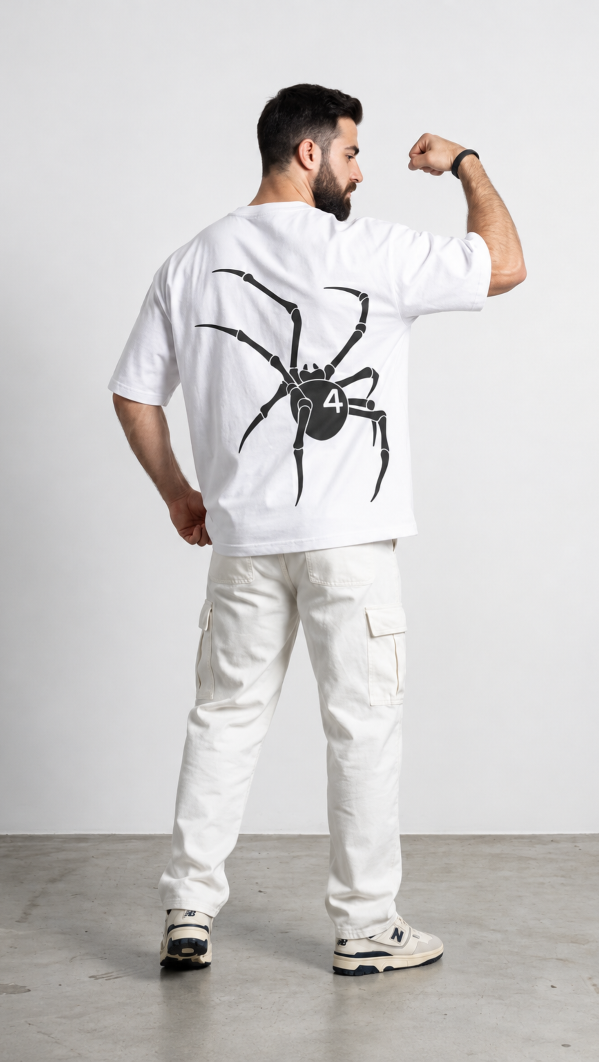 Spider web print shown close up on the Dripzy white oversized streetwear tee