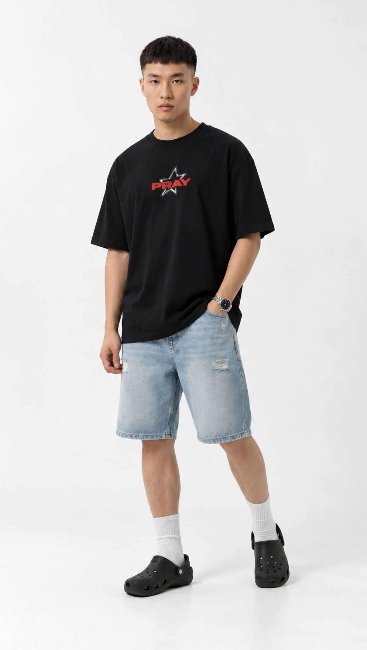 Pray lettering print shown close up on the Dripzy black oversized tee