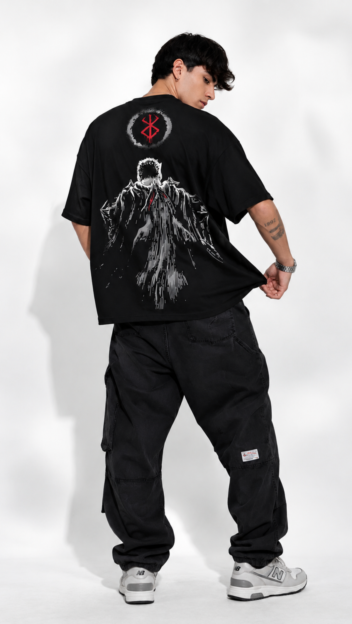 Guts Black Swordsman print detail on Dripzy heavyweight black oversized tee
