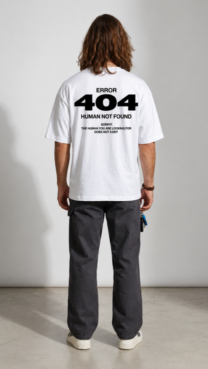 Human Not Found typography print close up on the Dripzy white oversized tee