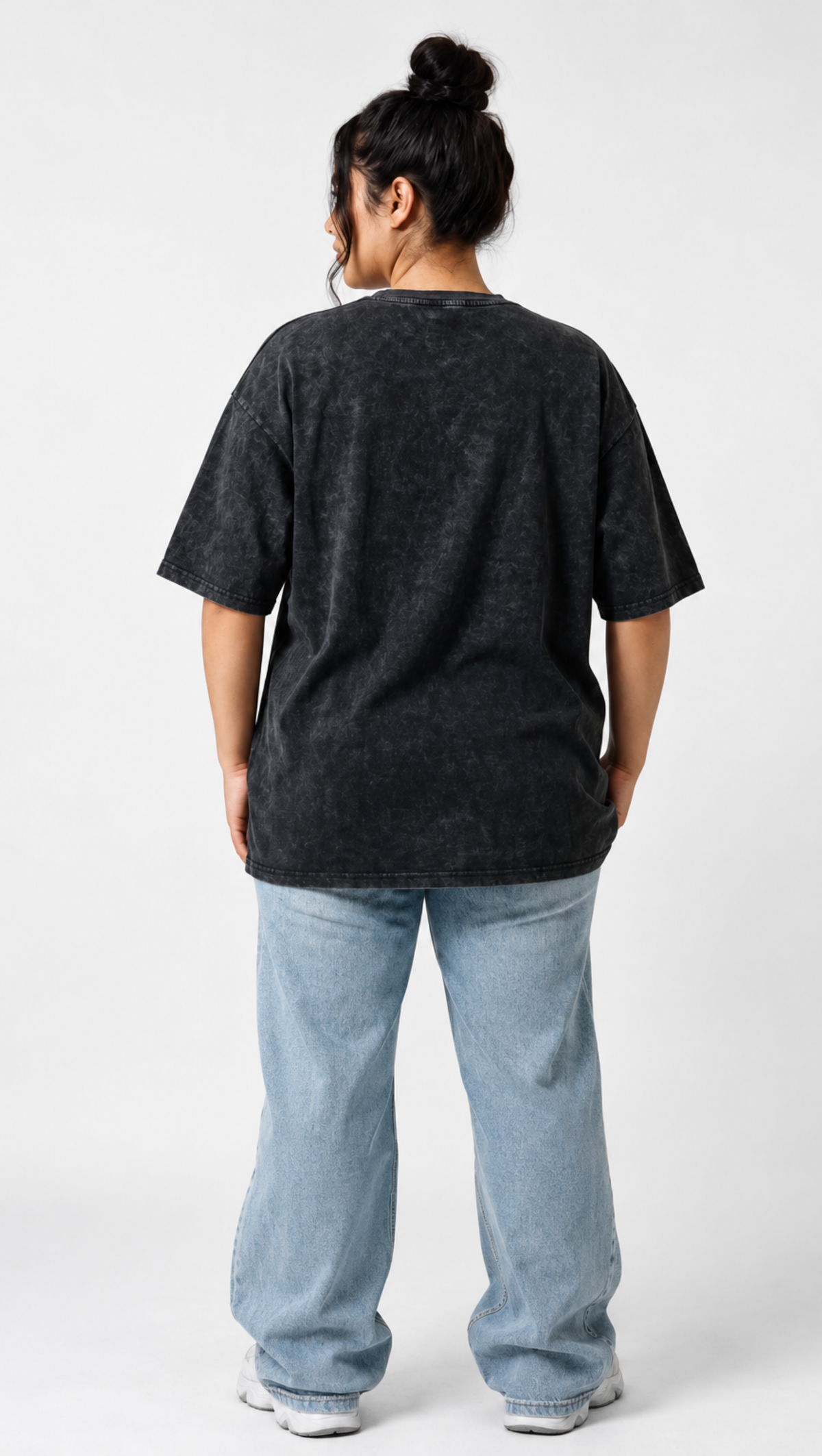 Faded black washed cotton shown close up on the Dripzy plain oversized tee