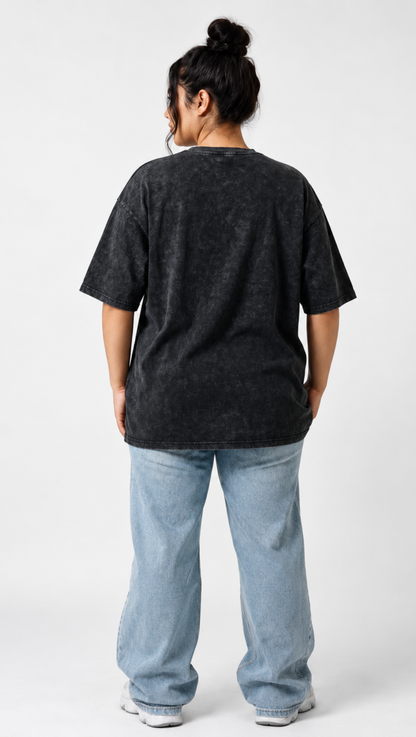 Faded black washed cotton shown close up on the Dripzy plain oversized tee