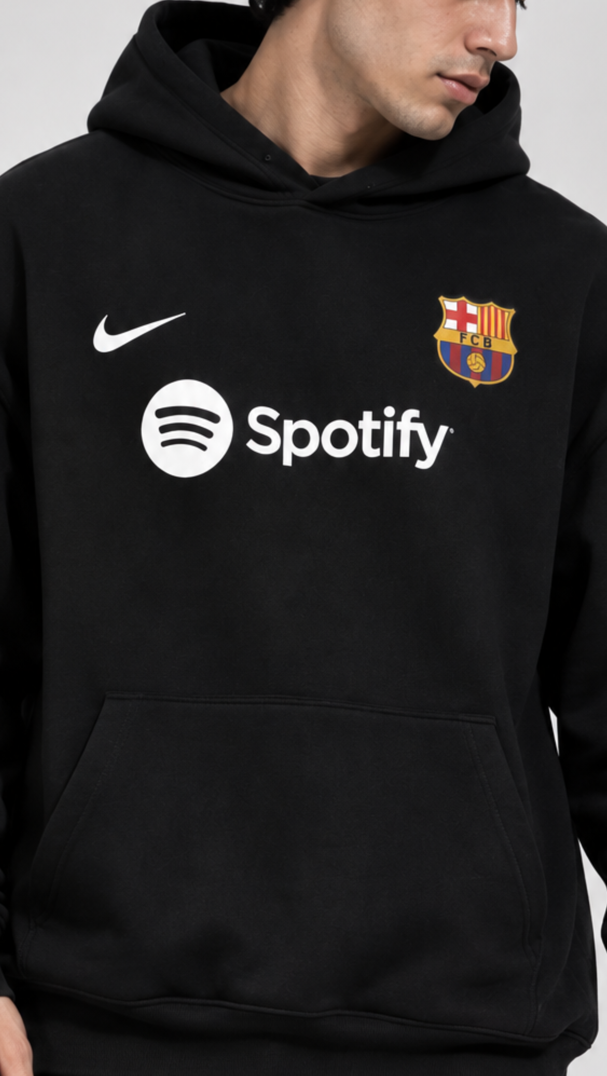 Barcelona-inspired chest print shown close up on the Dripzy black oversized fleece hoodie
