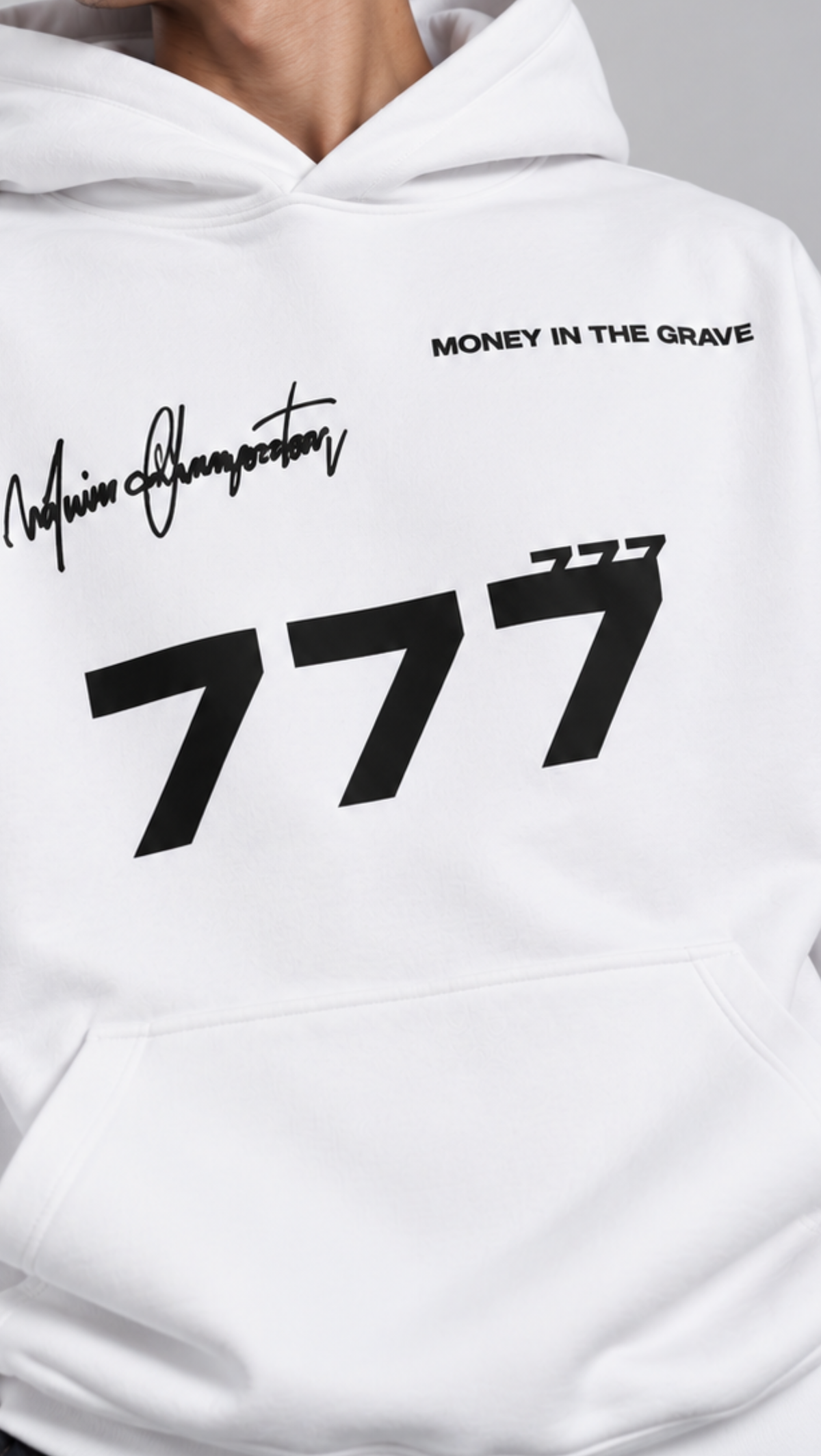 Oversized 777 numerals and icon detail on the back of the Dripzy white fleece hoodie