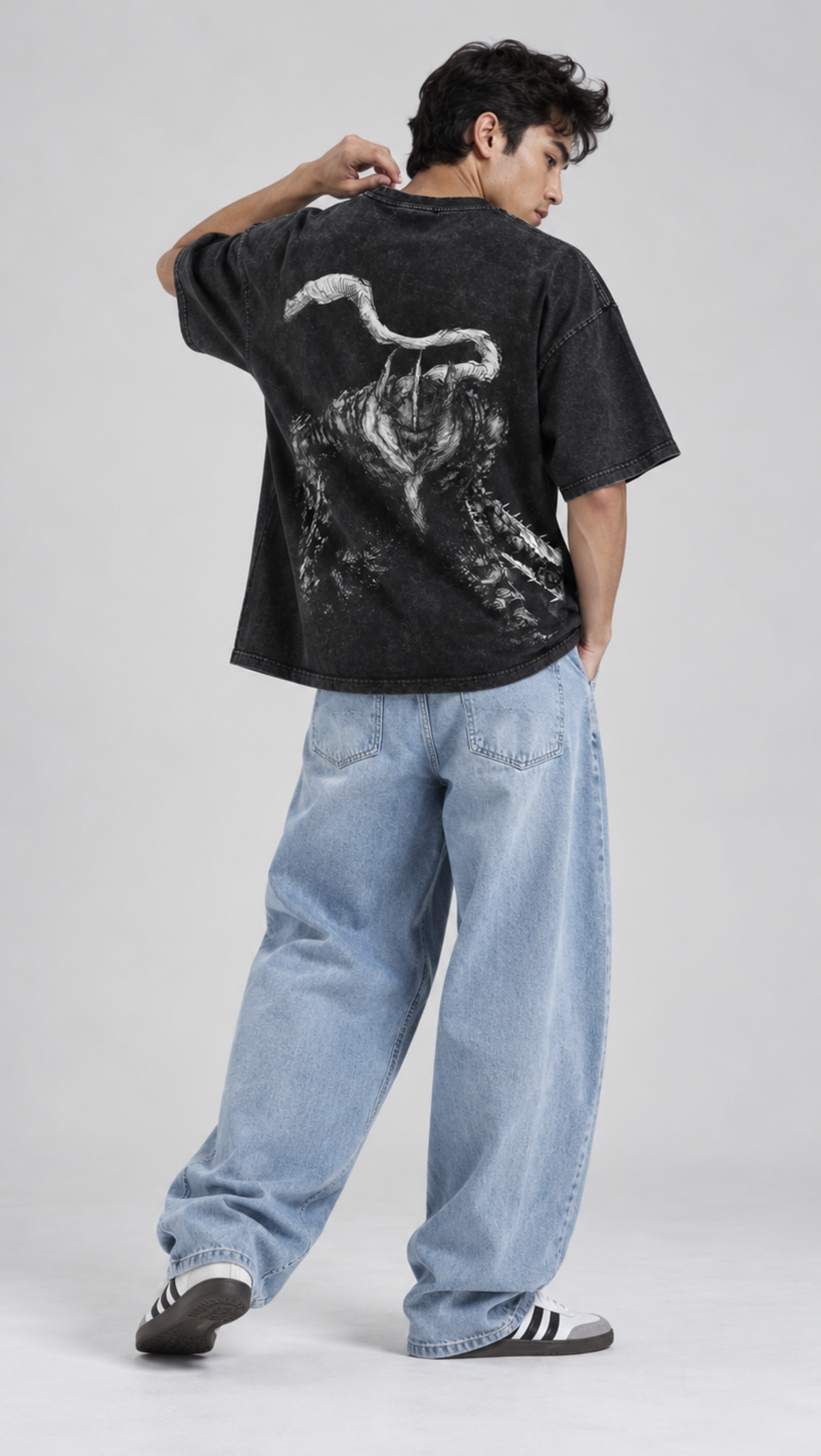 Ink-sketch beast back print on the Dripzy black garment-washed oversized tee