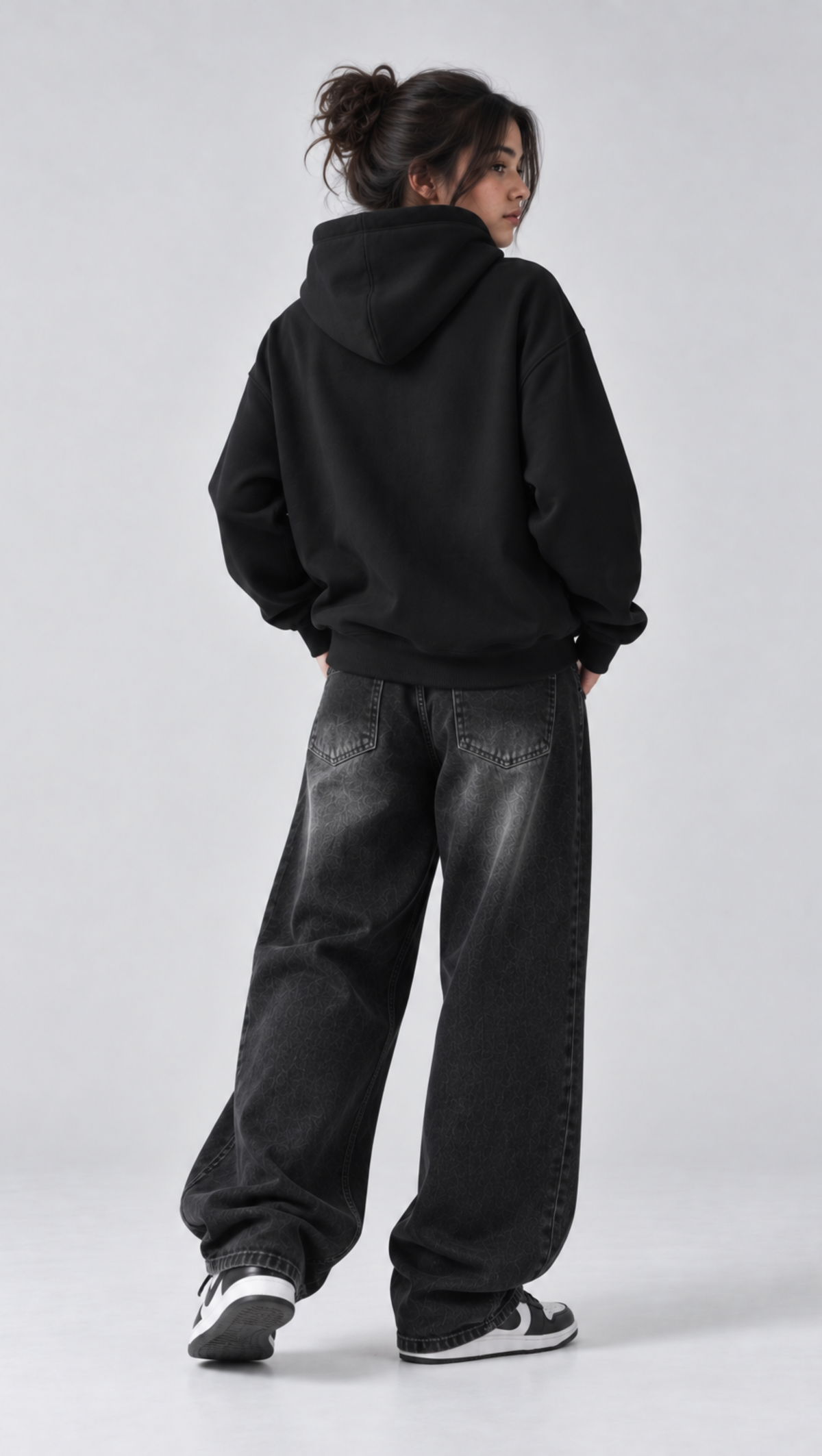 Back view of the Dripzy plain black oversized fleece hoodie with ribbed cuffs and hem