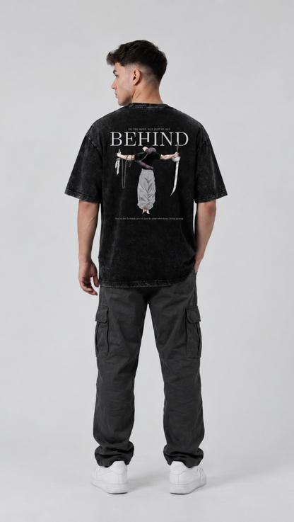 BEHIND back print shown on the Dripzy black garment-dyed washed oversized tee