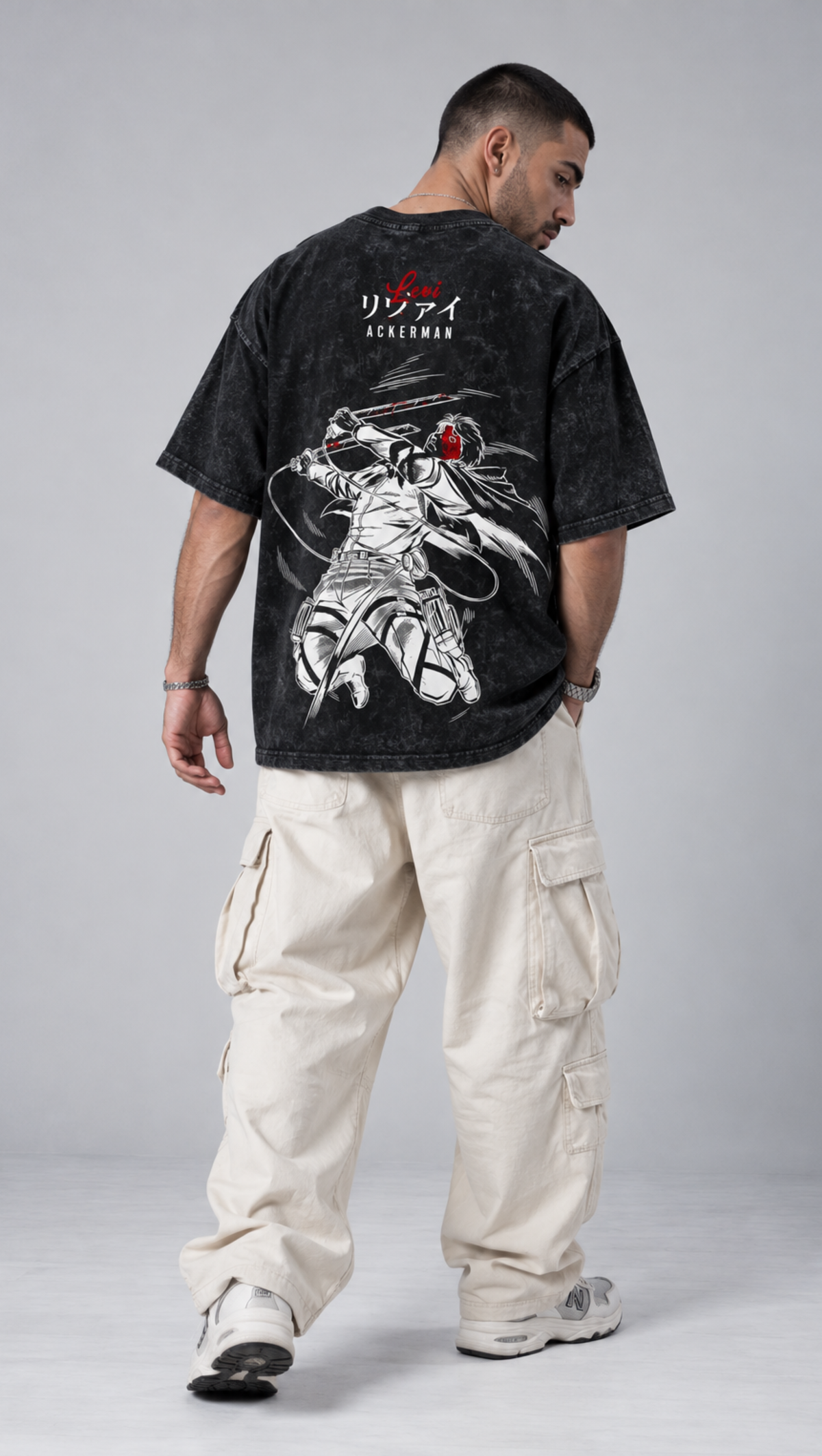 Levi Ackerman dual-blade back graphic on the Dripzy black washed oversized tee