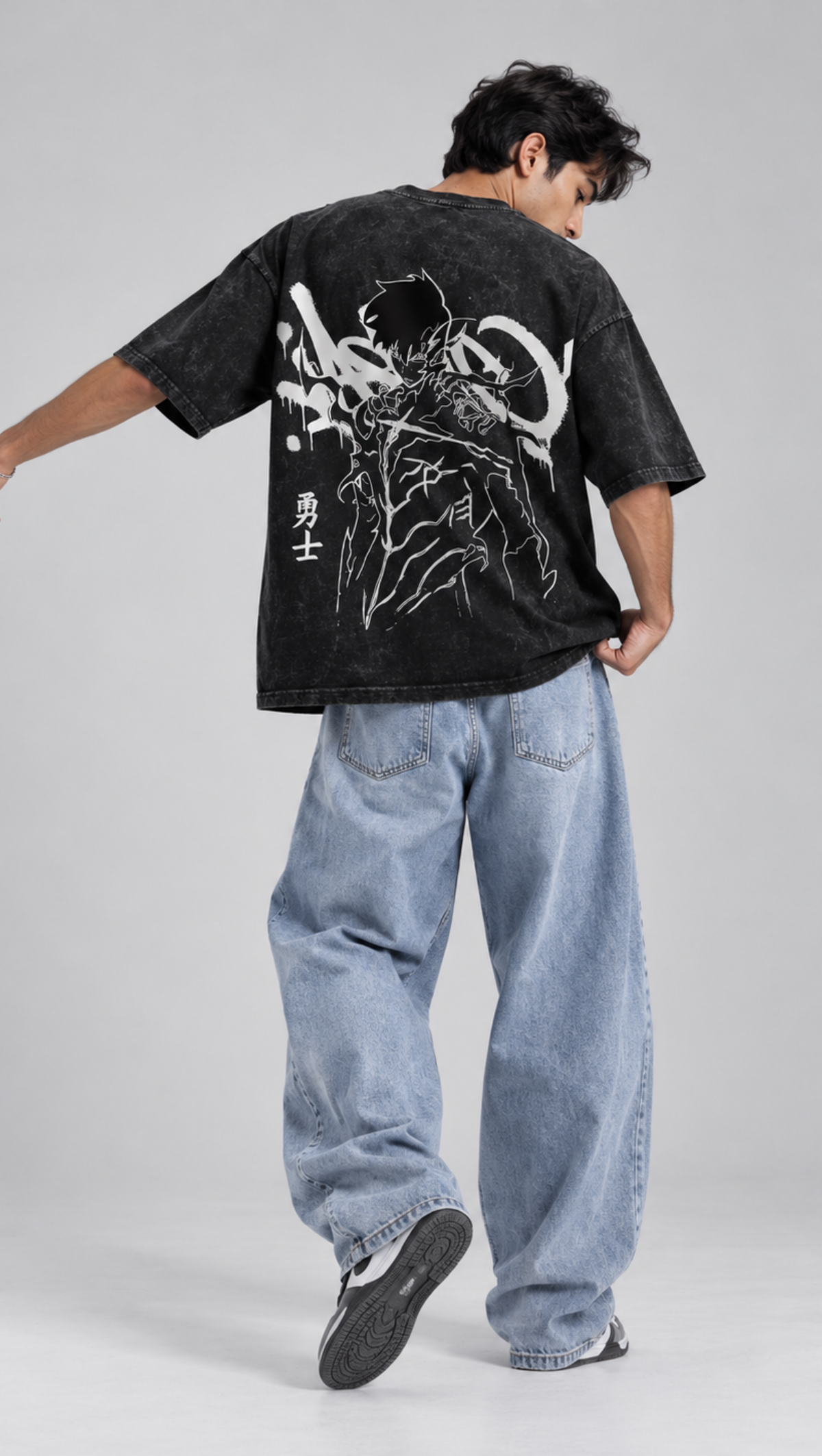 Graffiti-style warrior back print on the Dripzy black heavyweight cotton oversized tee