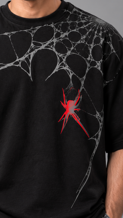 Close-up of the Spider-Man print on the Dripzy black oversized streetwear tee