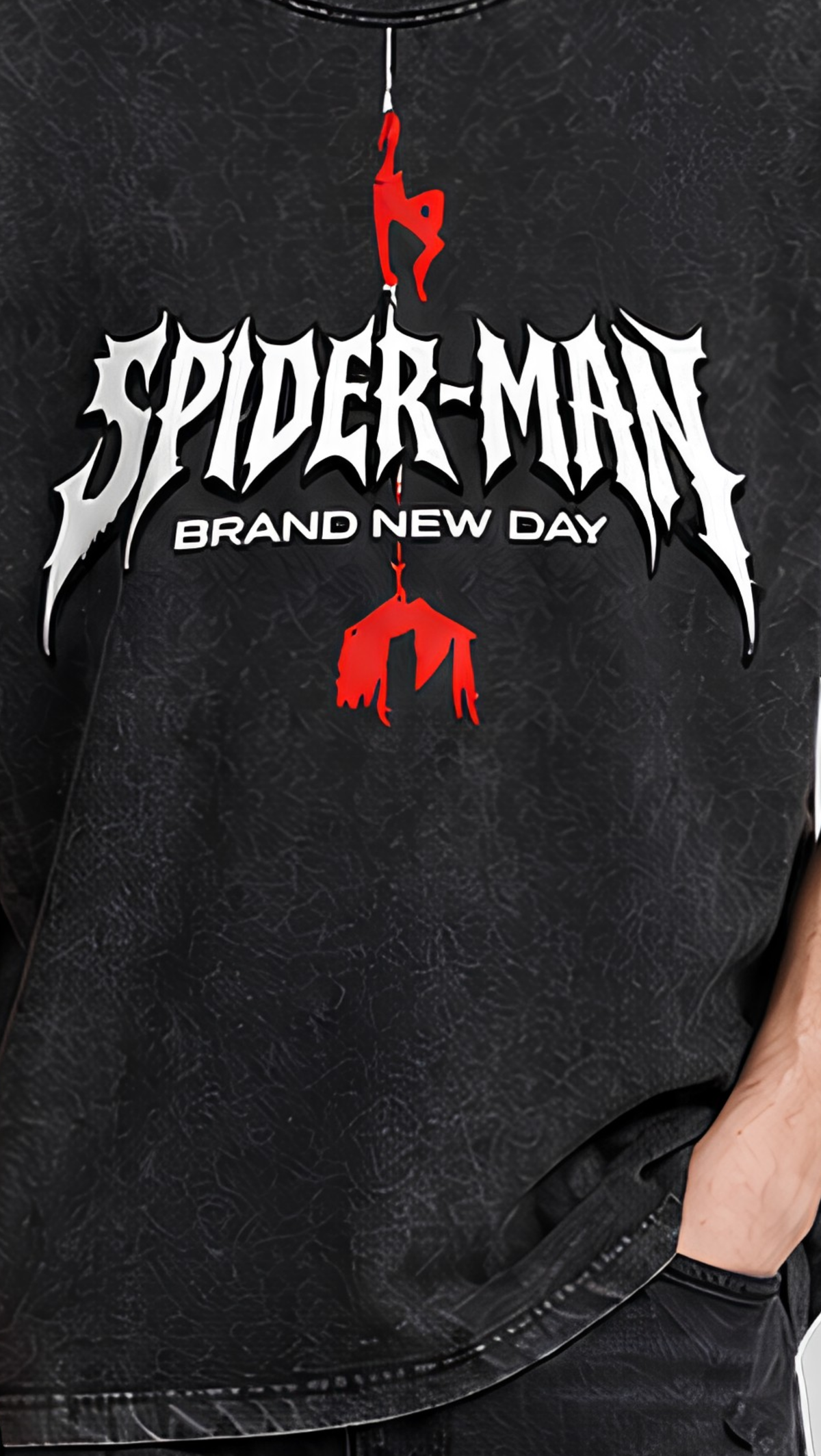Distressed spider-drop graphic detail on the Dripzy black washed oversized tee