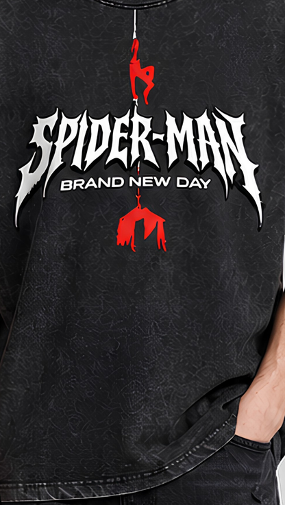 Distressed spider-drop graphic detail on the Dripzy black washed oversized tee